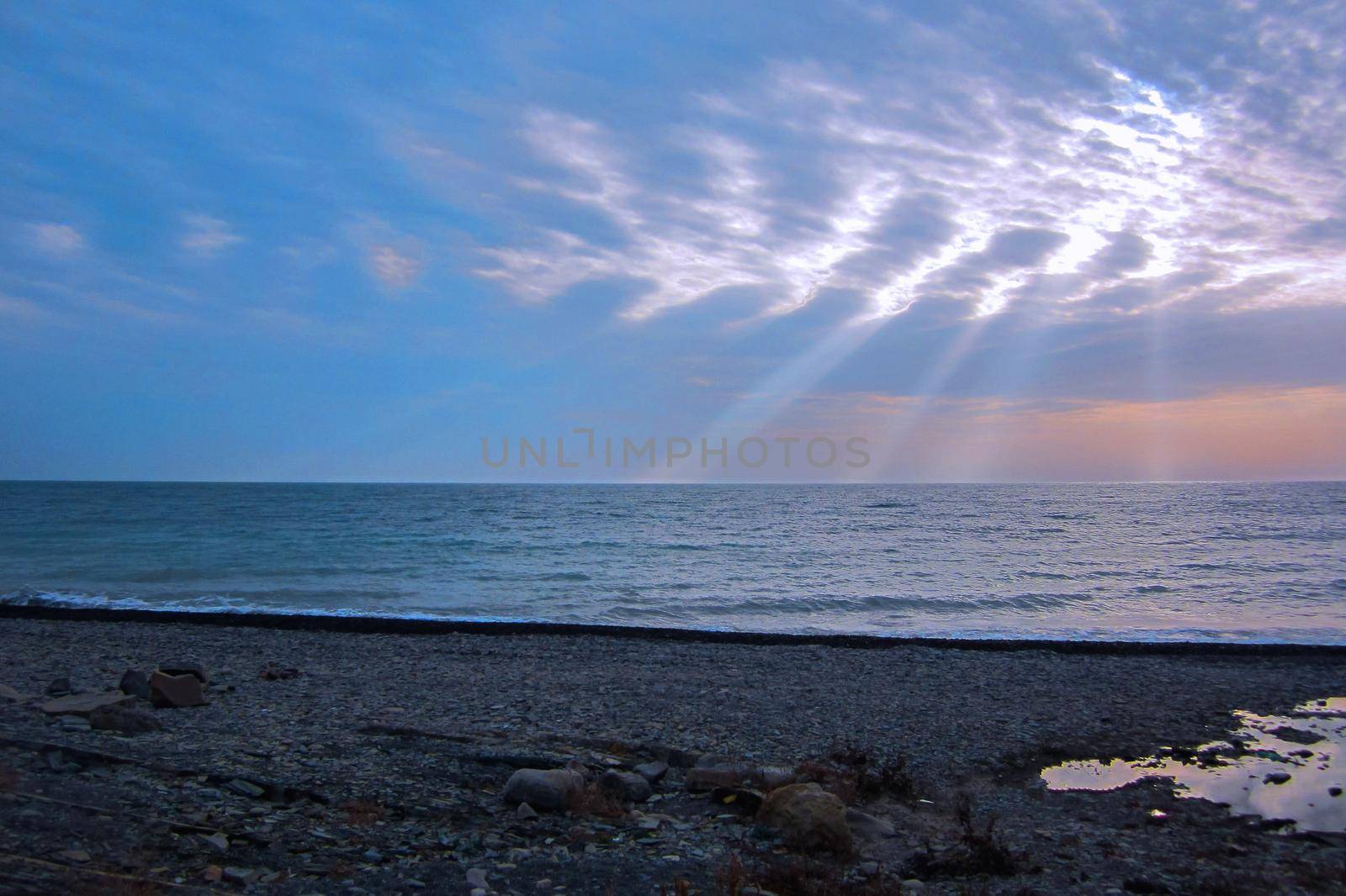 Sea shore and sun rays, blue sky, morning, summer, Russia