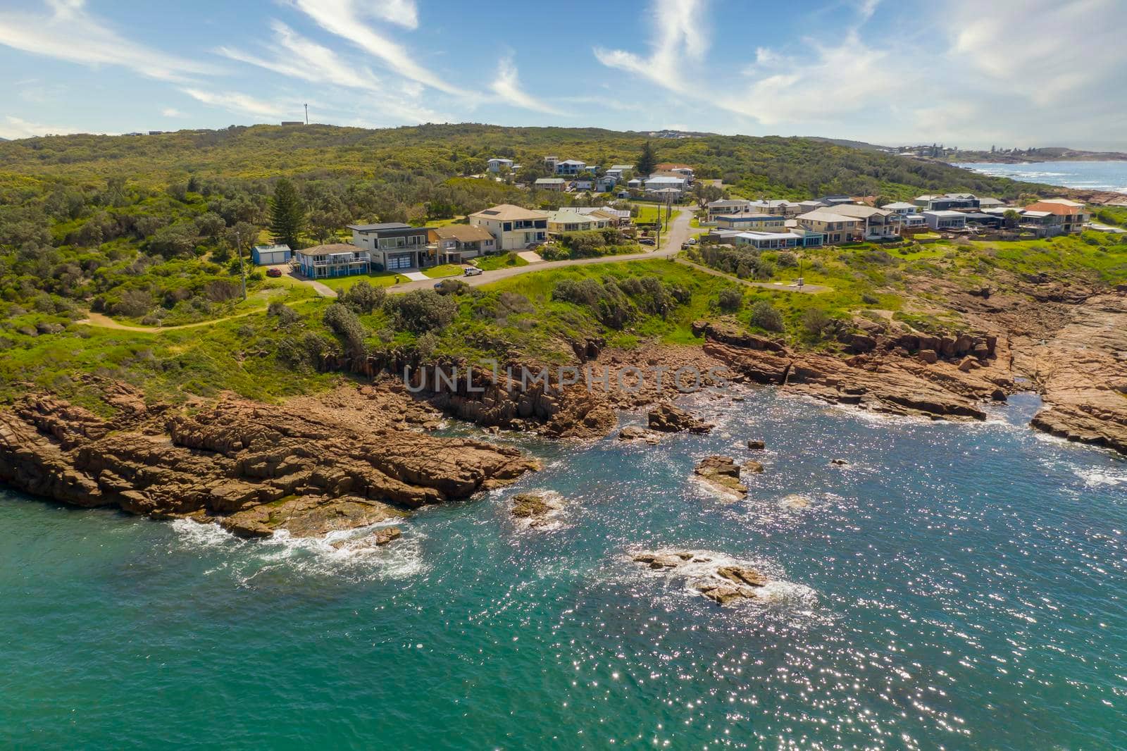 The coastline and Tasman Sea viewed from Birubi Point in regional Australia by WittkePhotos