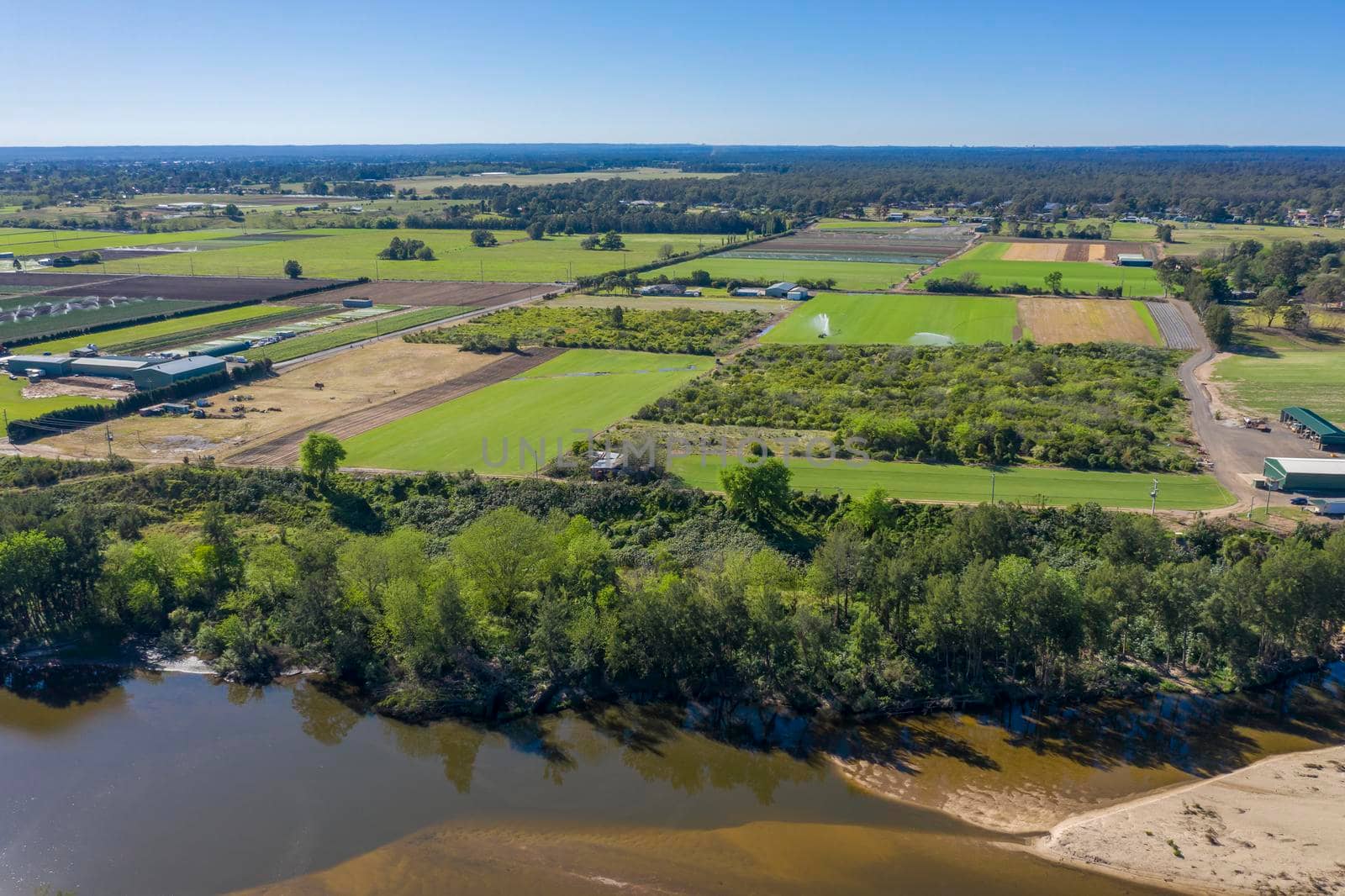 Aerial view of the Hawkesbury River and farmland in regional New South Wales in Australia by WittkePhotos