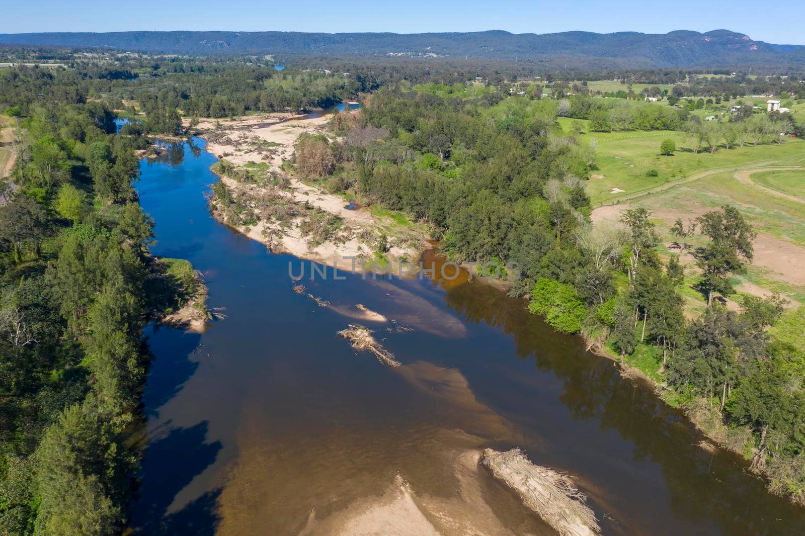 Aerial view of the Hawkesbury River and farmland in regional New South Wales in Australia by WittkePhotos