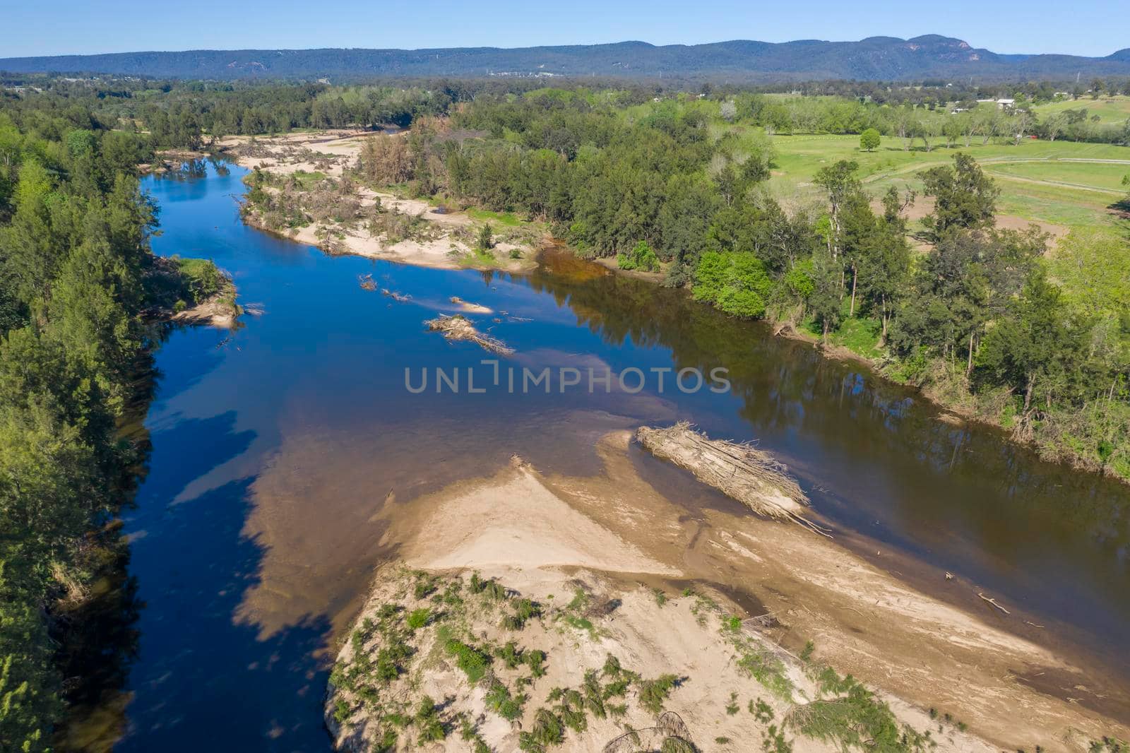 Aerial view of the Hawkesbury River and farmland in regional New South Wales in Australia by WittkePhotos