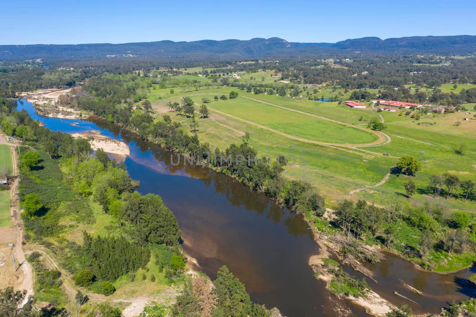 Aerial view of the Hawkesbury River and farmland in regional New South Wales in Australia by WittkePhotos