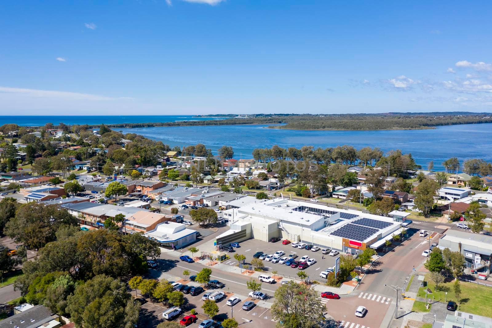 Aerial view of Lake Munmorah and the township of Budgewoi on the central coast of regional New South Wales in Australia