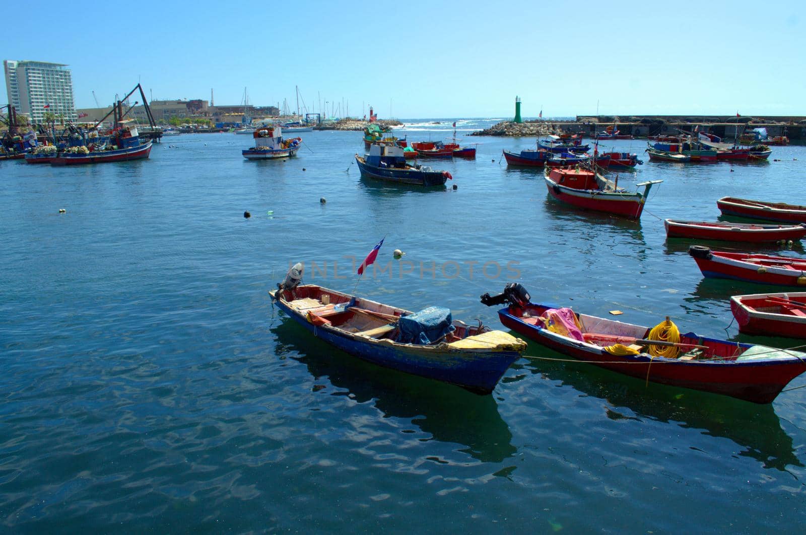 Fishing boats in the harbor of Antofagasta, Chile by hernan_hyper