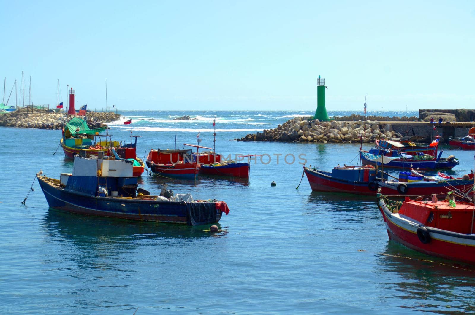 Fishing boats in the harbor of Antofagasta, Chile by hernan_hyper