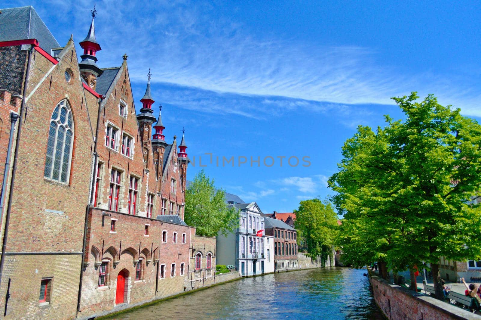 Picturesque houses by the canal in Brugge, Belgium. by hernan_hyper