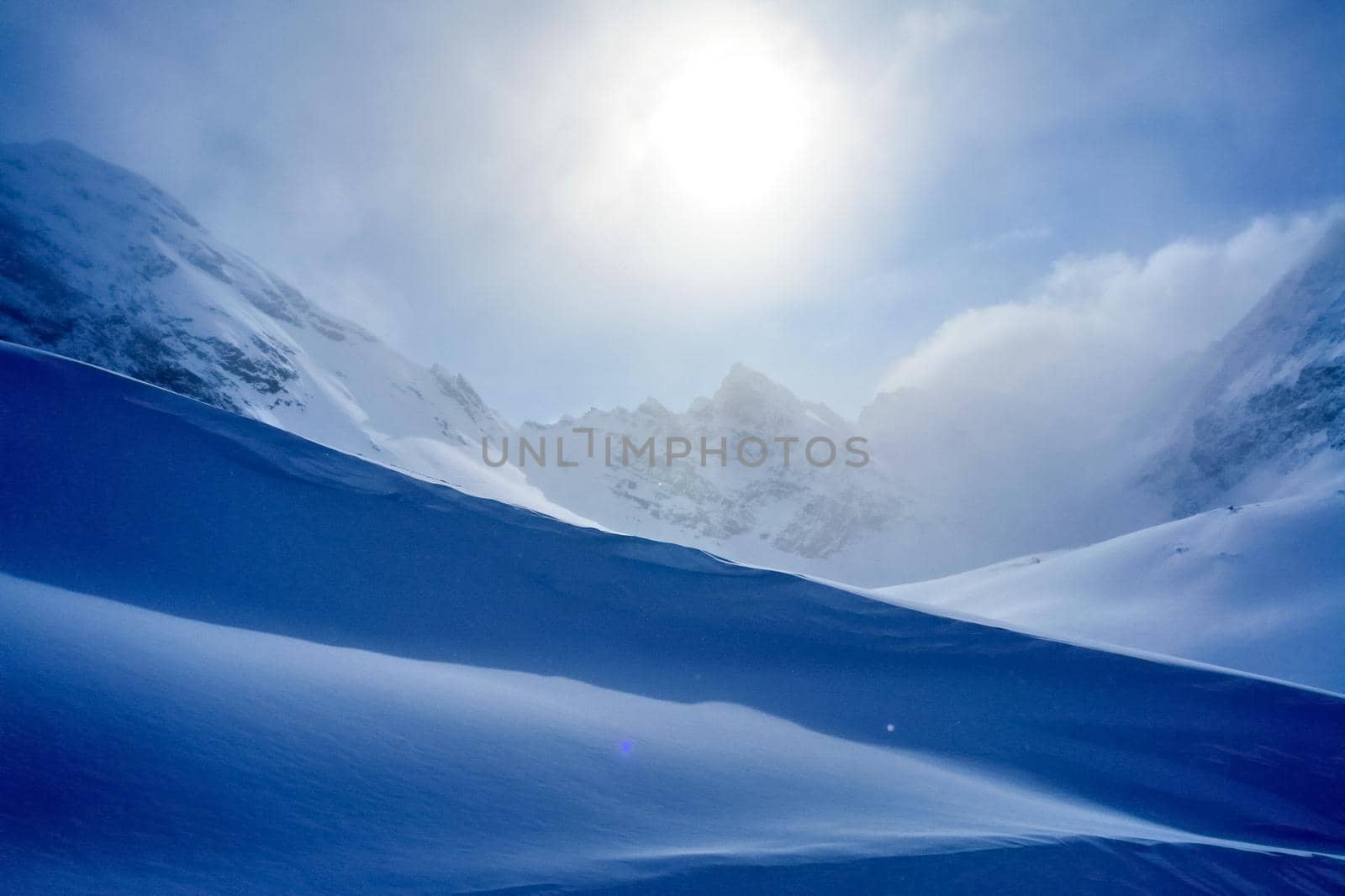 Baikal mountains in winter in snow. Forest in snow-covered mountains.