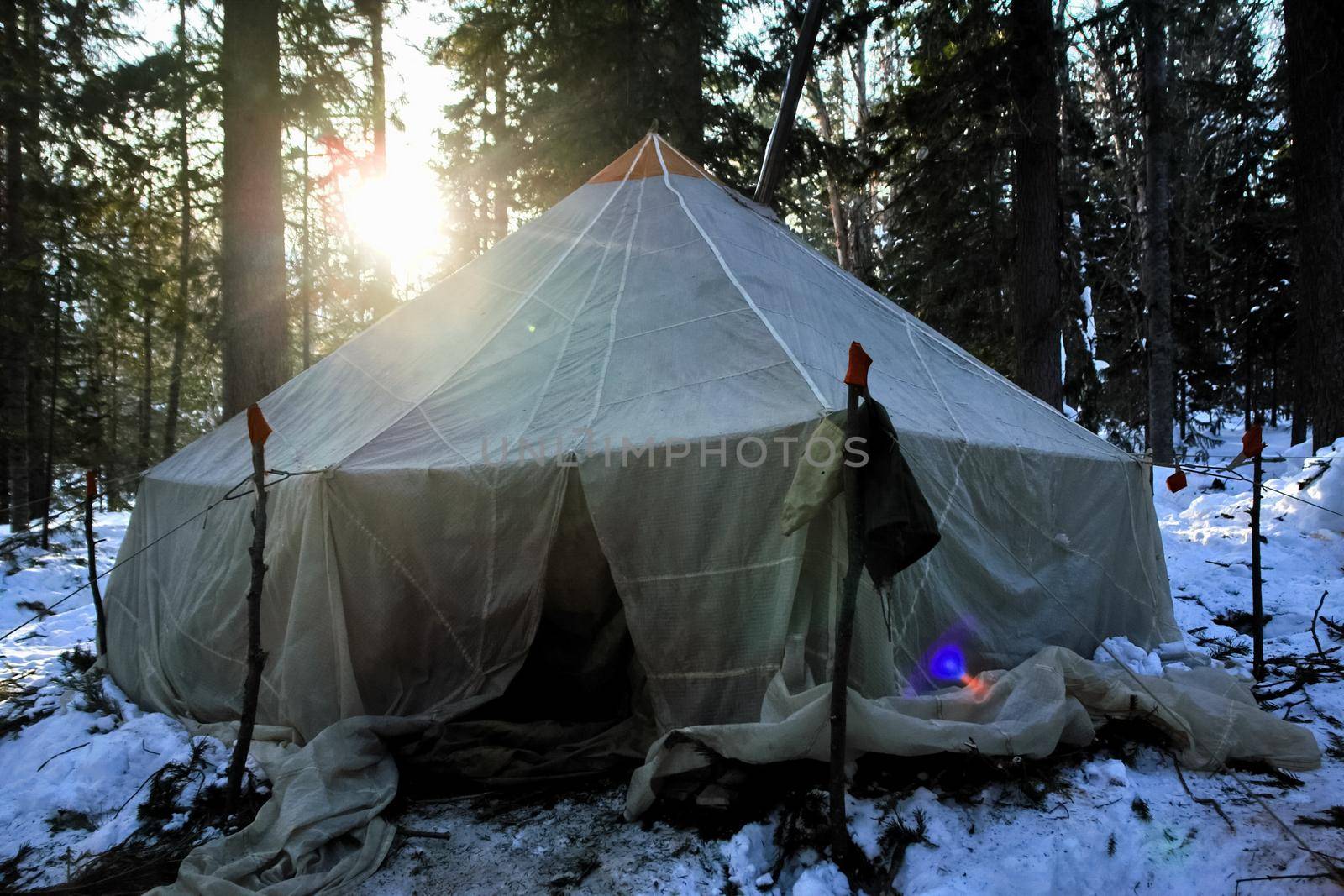 large tourist tent in the winter forest. by DePo