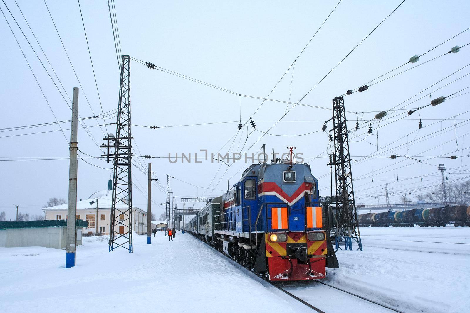 Tankhoy, Russia - January 20, 2019: Passenger train at the station. Russia, Baikal railways.