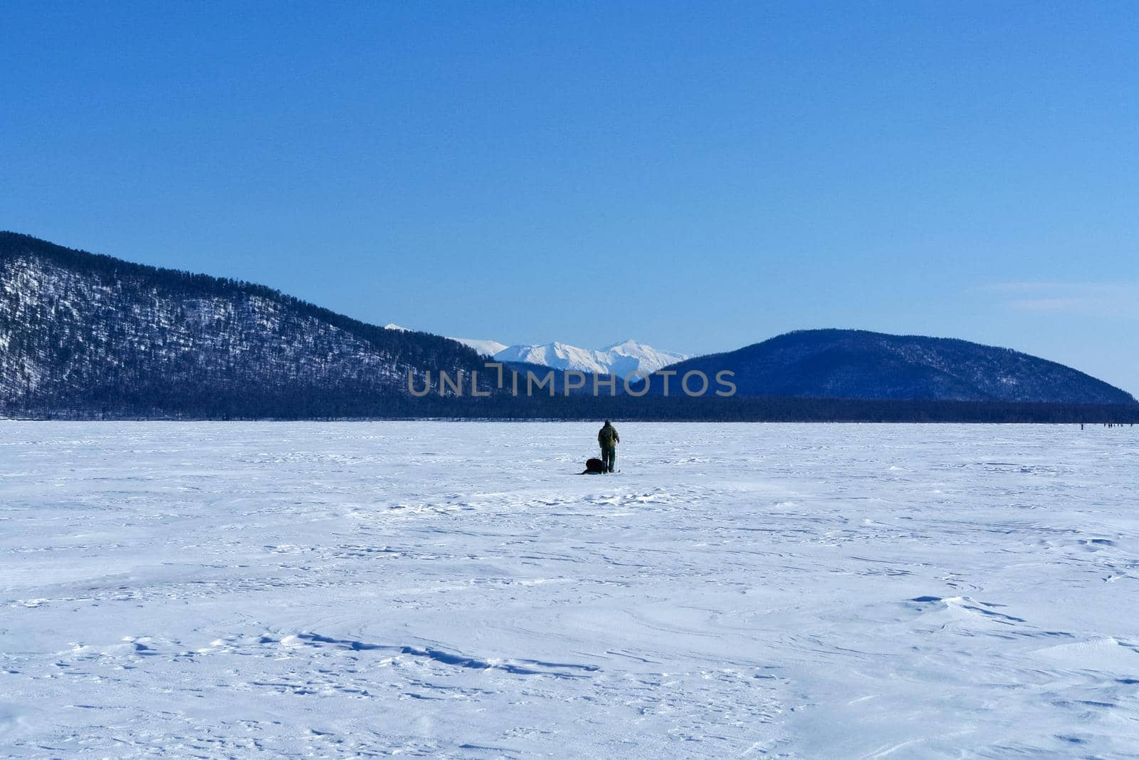 ski slope on shore of Lake Baikal. Ski track. by DePo