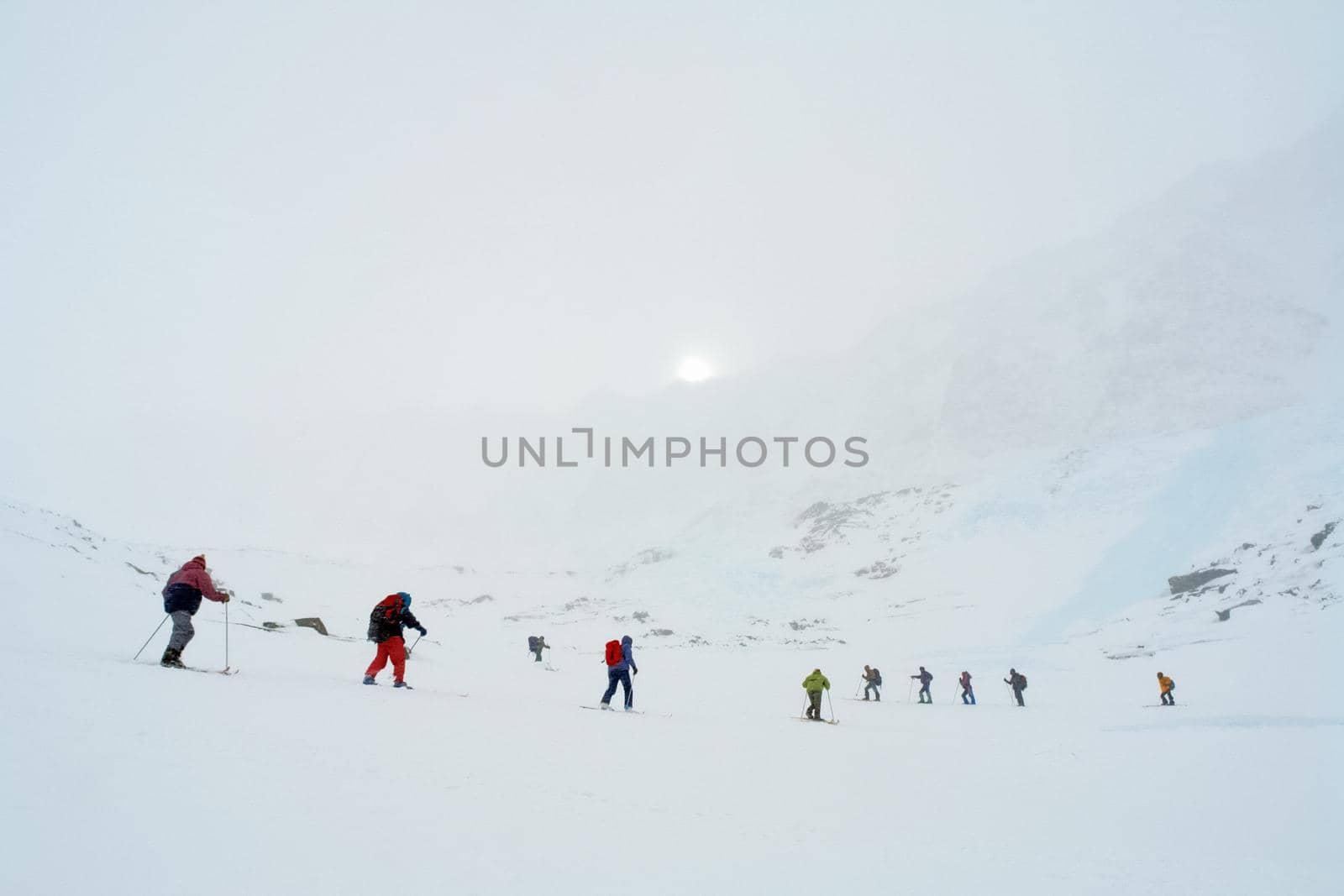 Tankhoy, Russia - January 20, 2019: Skiers ride in the snow in the mountains of Baikal