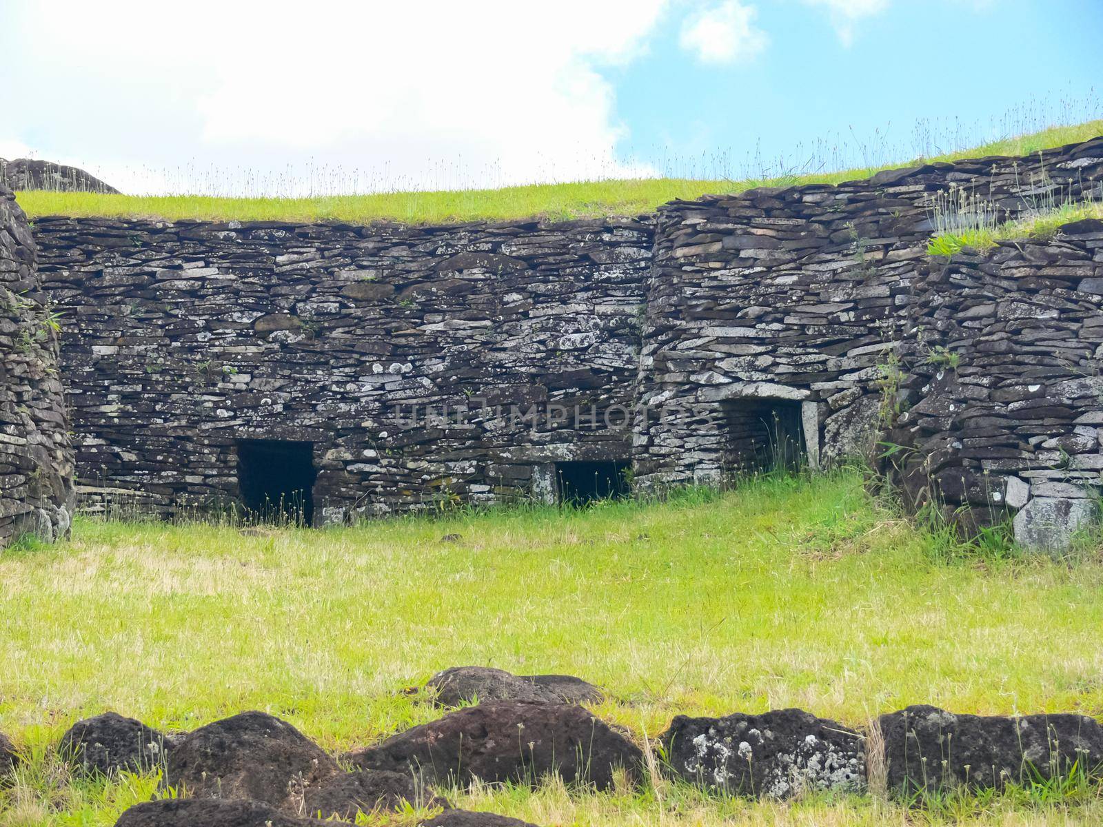 dwellings of ancient aboriginals on Easter Island. made of shelter stones and walls. by DePo