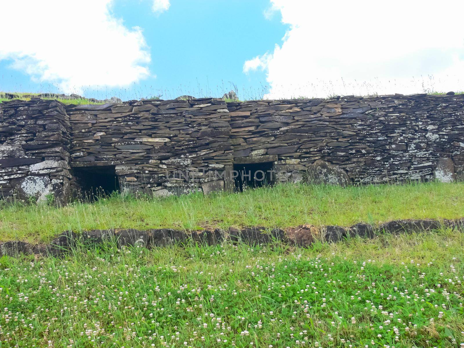 dwellings of ancient aboriginals on Easter Island. made of shelter stones and walls. by DePo