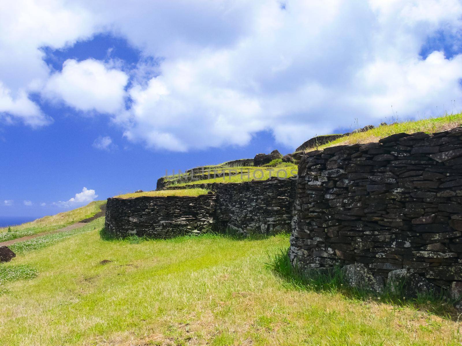 dwellings of ancient aboriginals on Easter Island. made of shelter stones and walls. by DePo