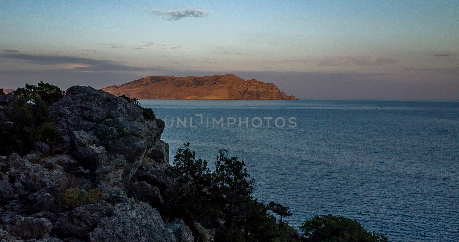View of the Meganom Peninsula from Cape Alchak in Crimea on a warm summer evening.