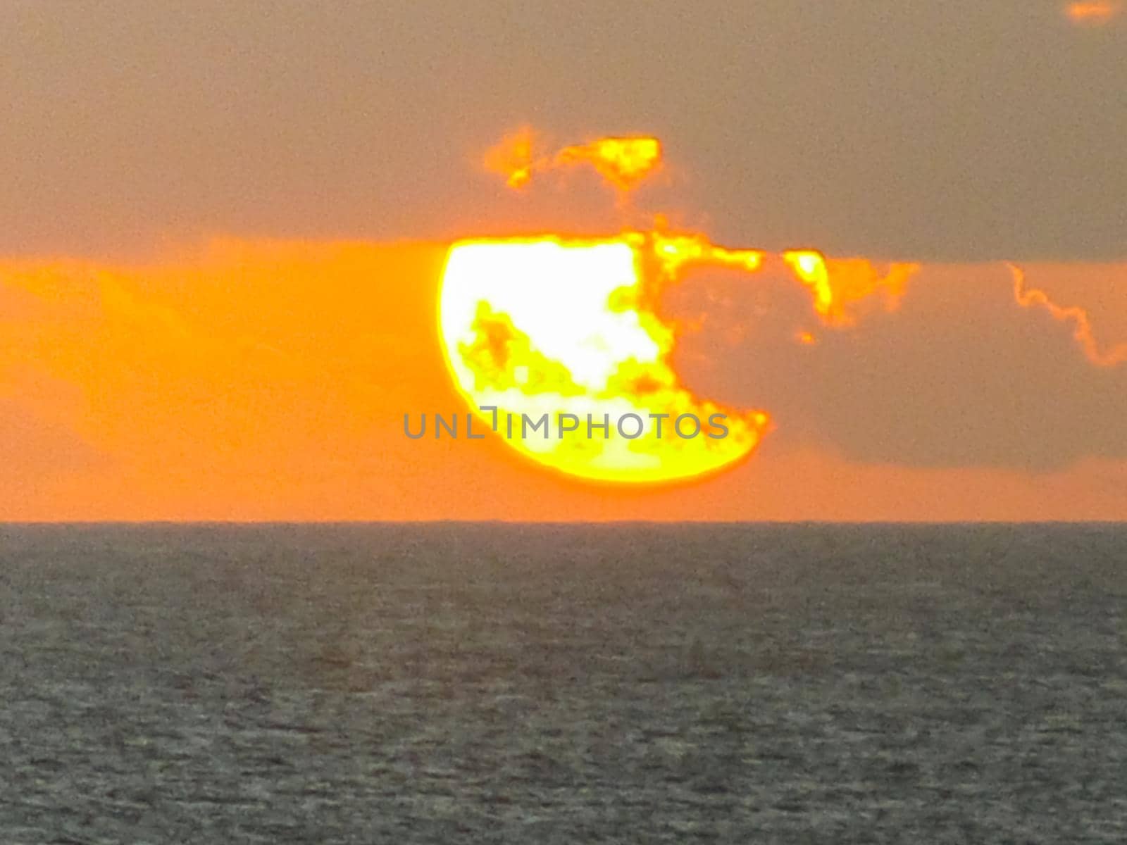 Sunset on Easter Island. The colors of sunset in the ocean.