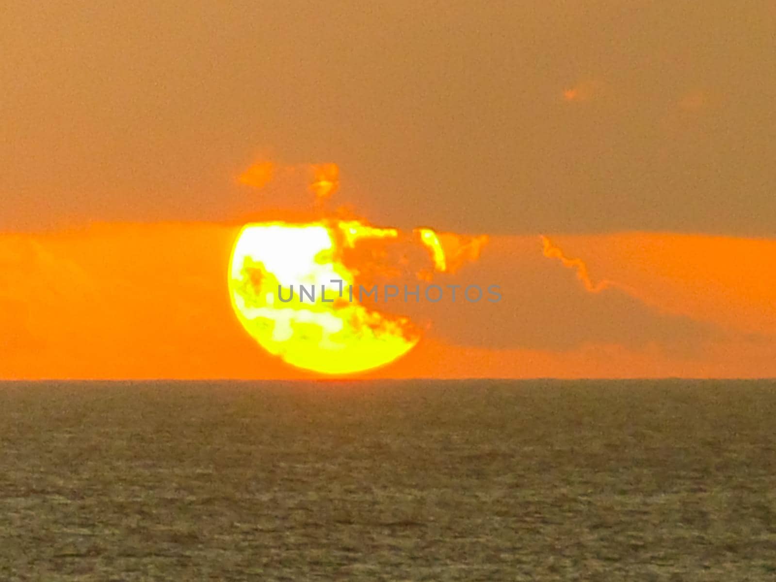 Sunset on Easter Island. The colors of sunset in the ocean.