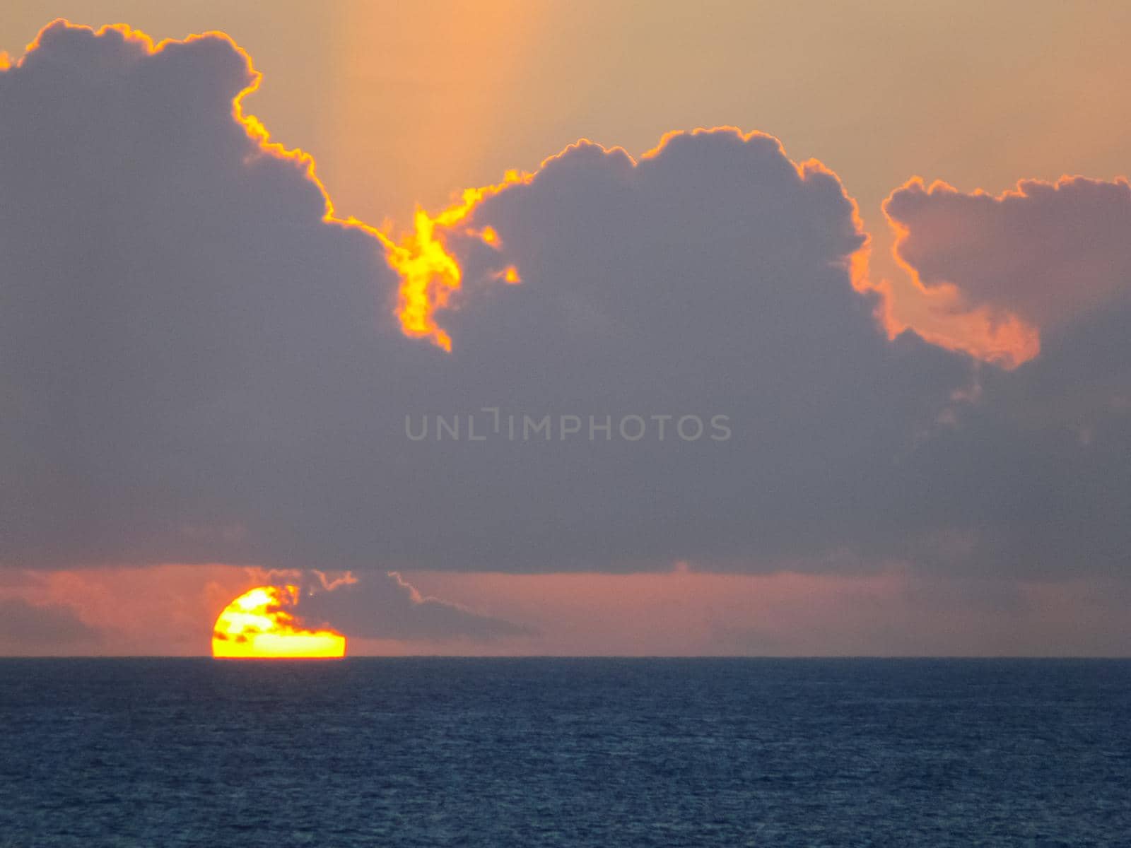 Sunset on Easter Island. The colors of sunset in the ocean.