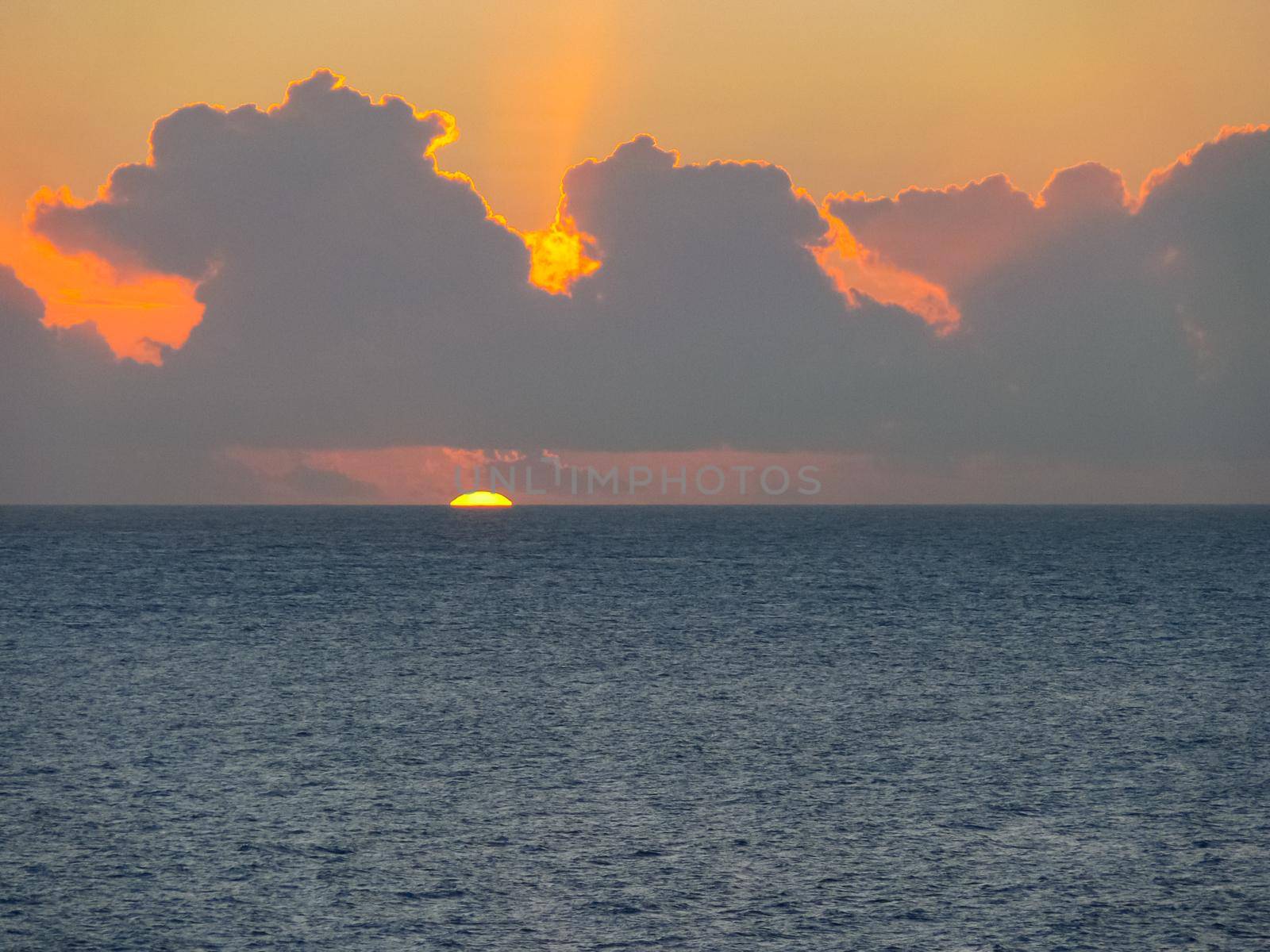 Sunset on Easter Island. The colors of sunset in the ocean.