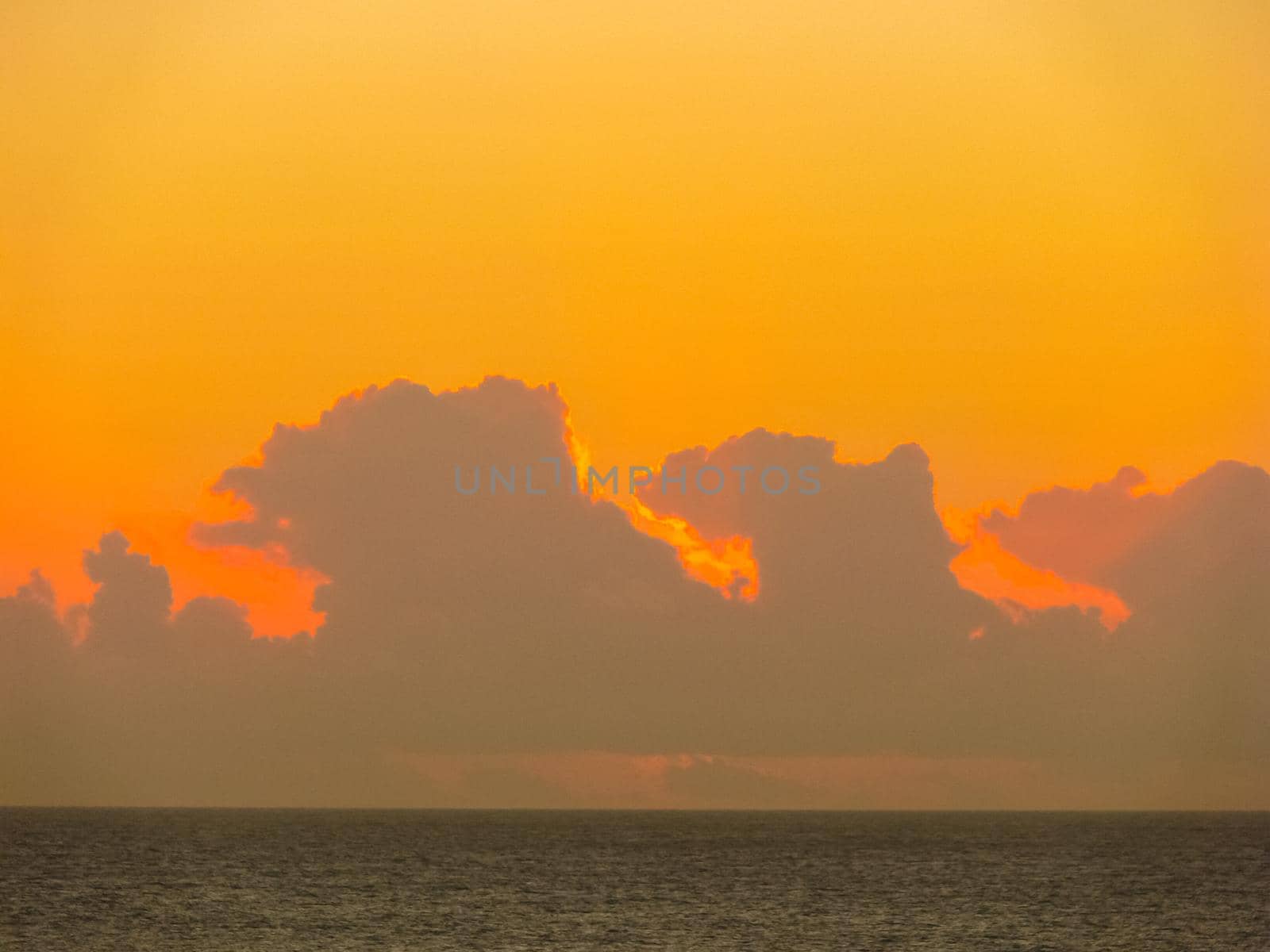 Sunset on Easter Island. The colors of sunset in the ocean.