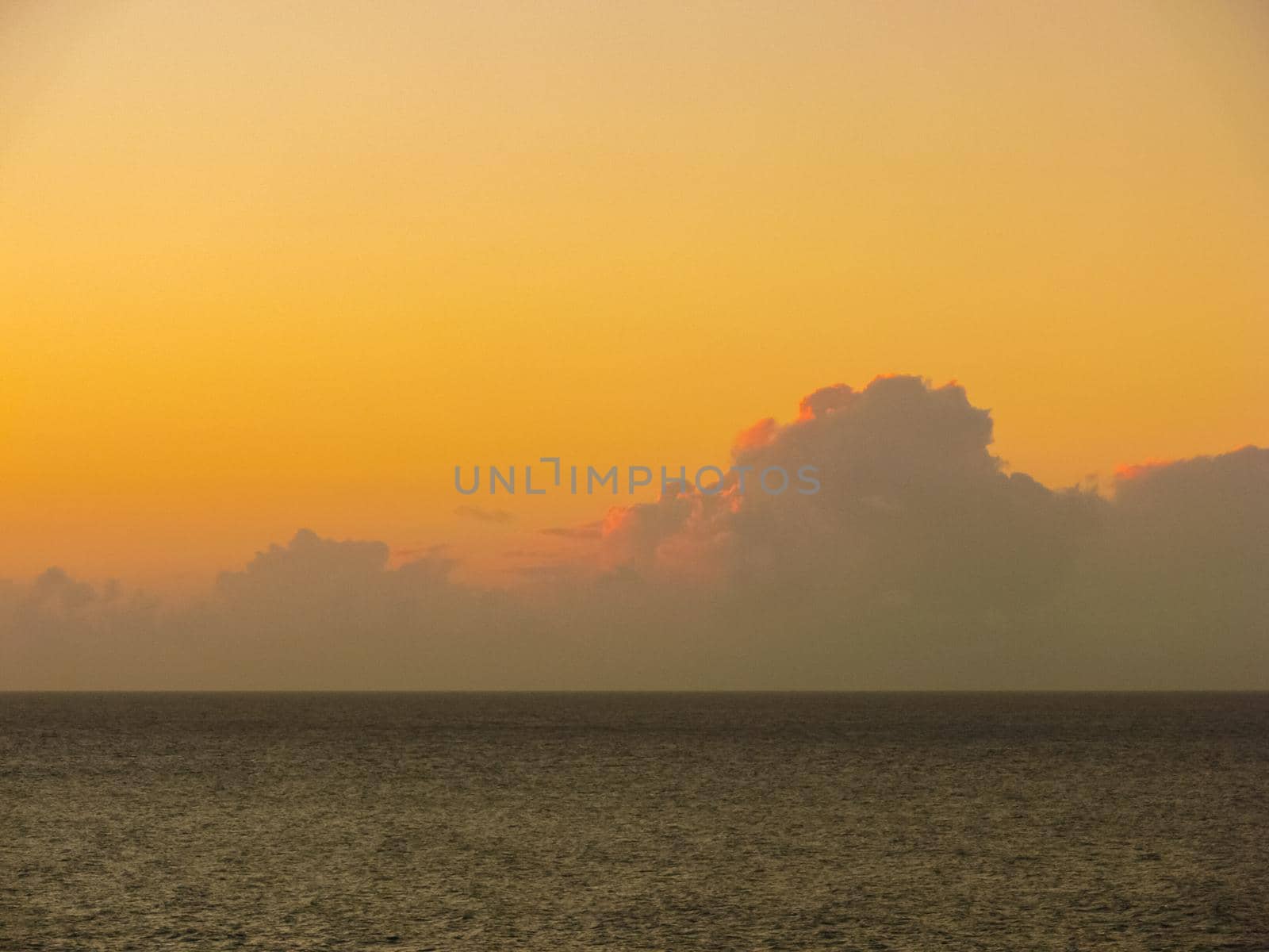 Sunset on Easter Island. The colors of sunset in the ocean.