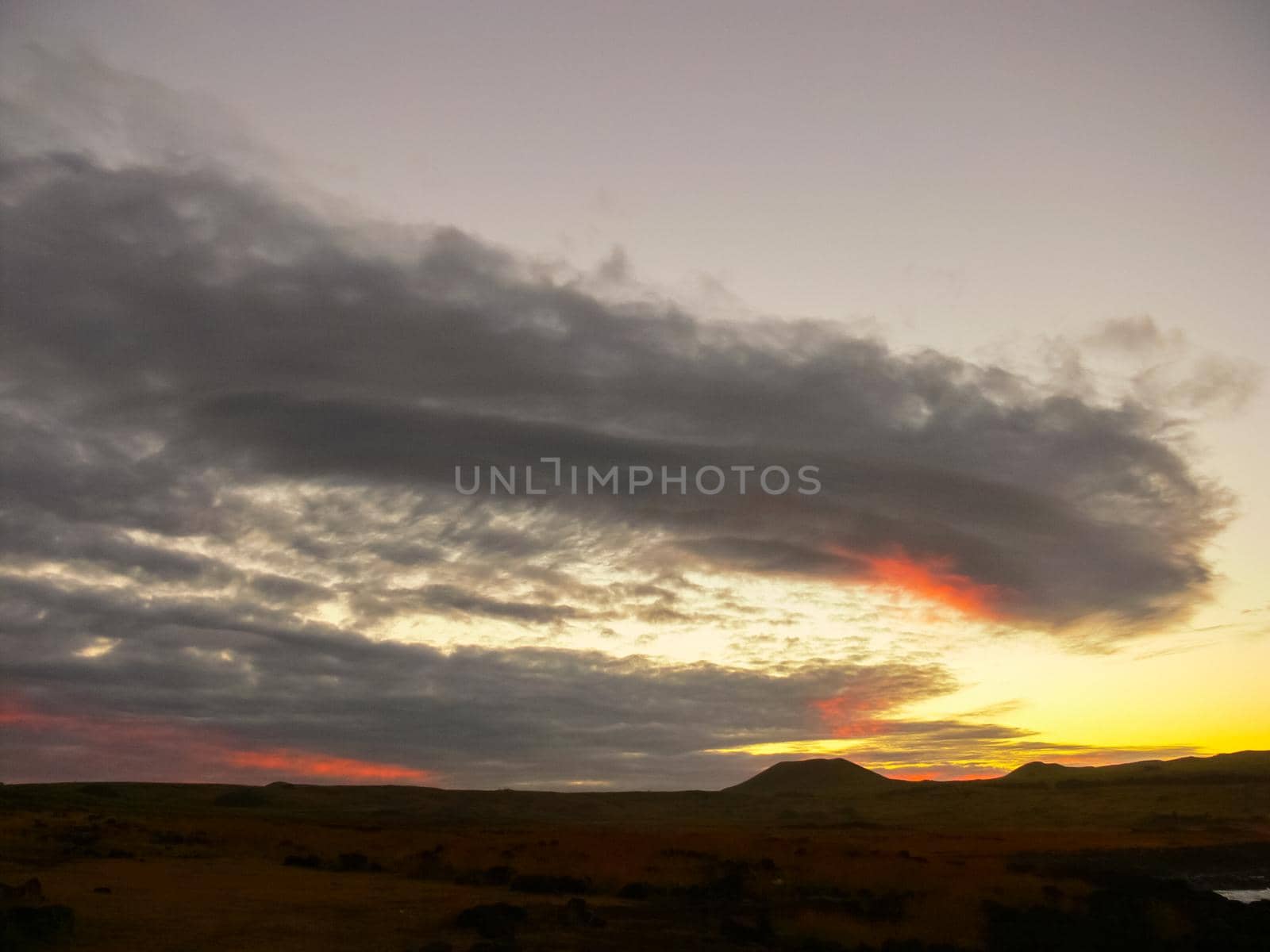 Sunset on Easter Island. The colors of sunset in the ocean.