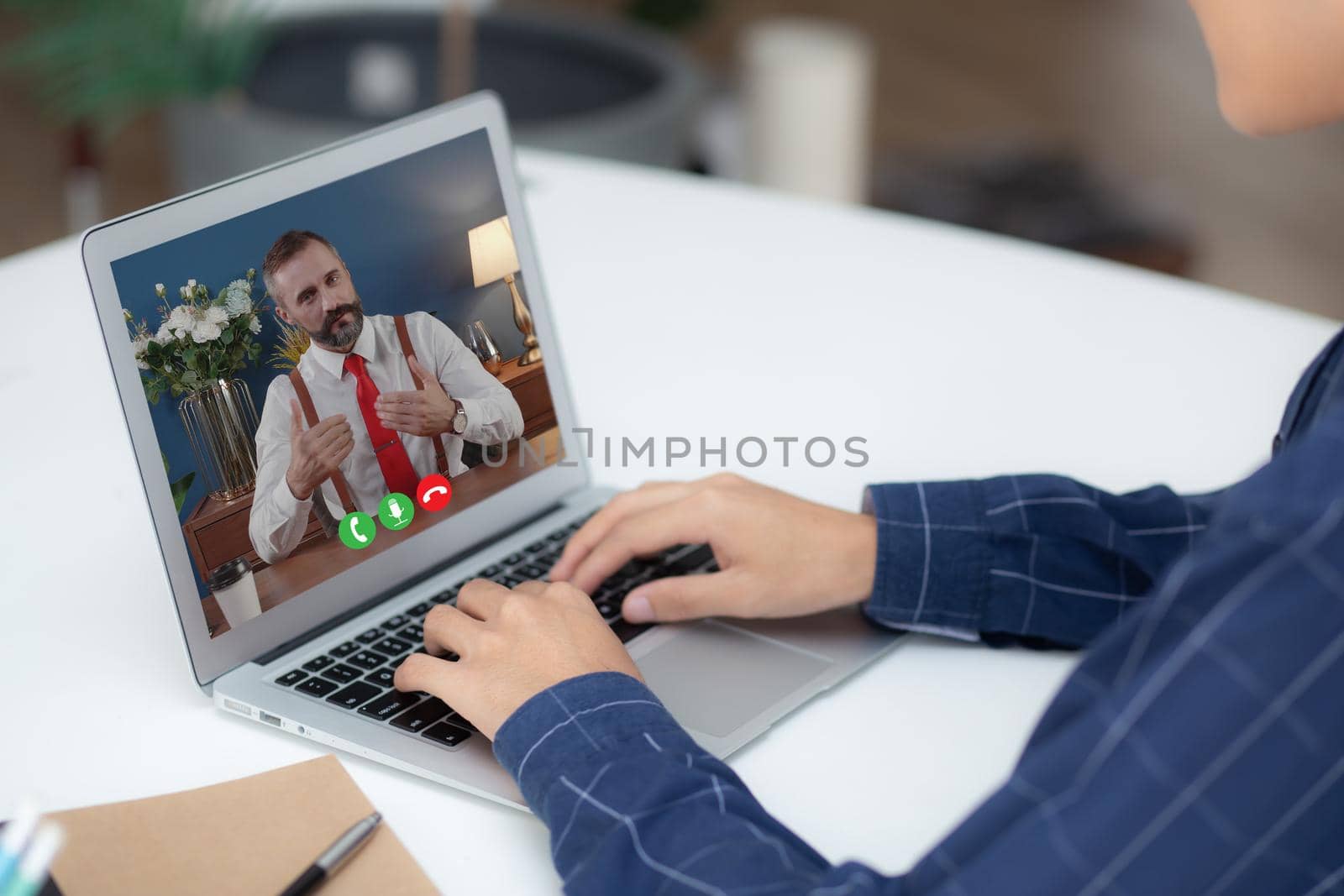 Young business man using laptop computer blank screen on desk at home, businessman work on notebook to internet online copy space for your text message, male typing keyboard, communication concept.