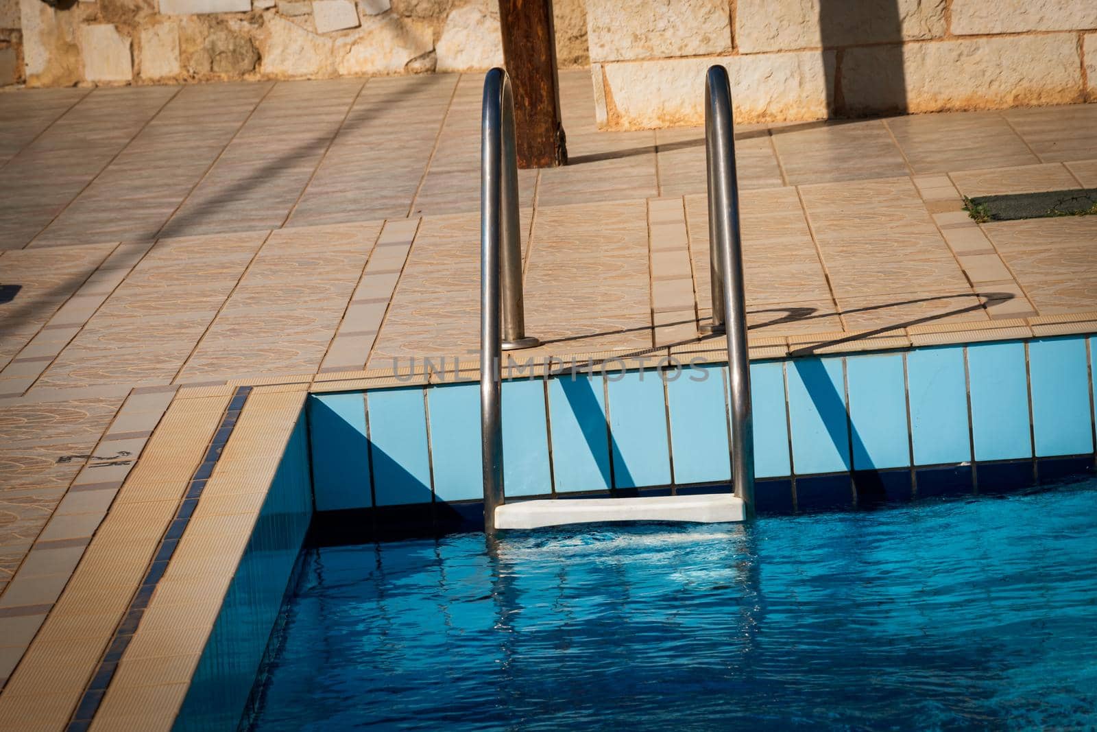 Closeup shot of a swimming pool ladder