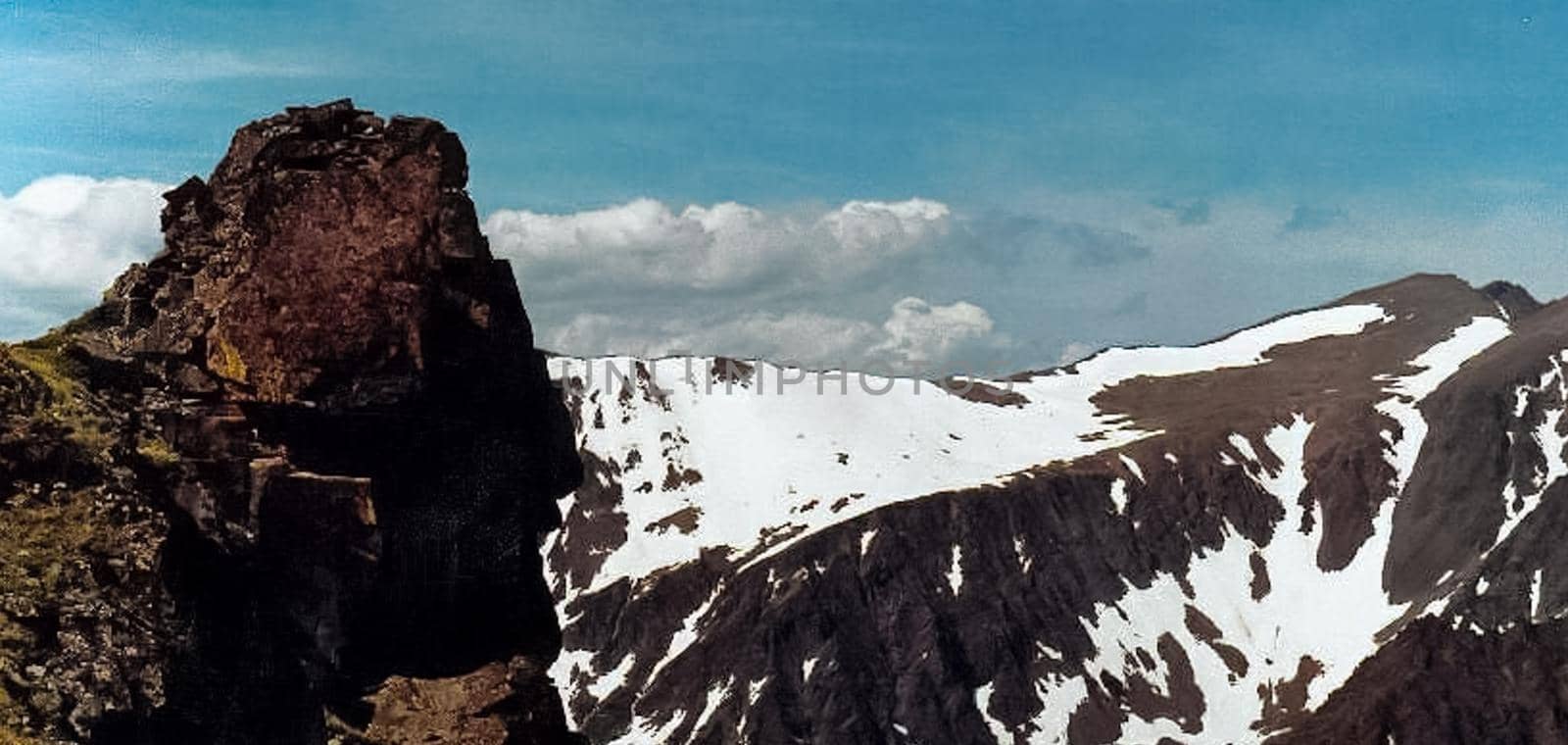 Mount Sayan in winter in the snow. The nature of the mountains is sayan.