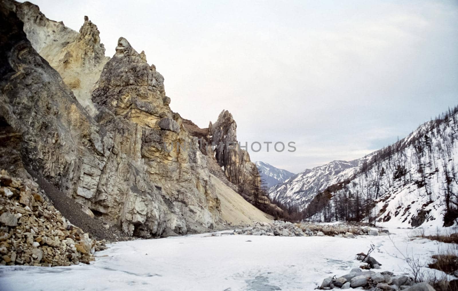 Mount Sayan in winter in the snow. The nature of the mountains is sayan.