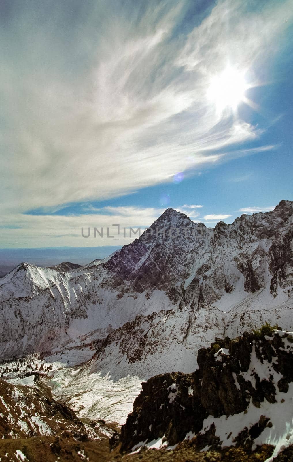 Mount Sayan in winter in the snow. The nature of the mountains is sayan.