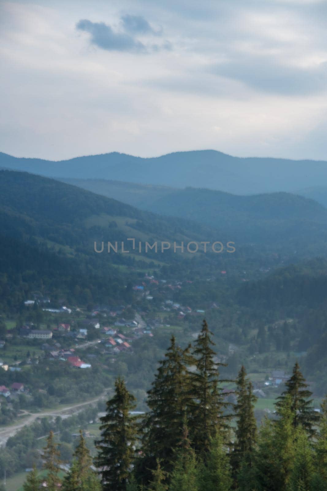 Natural landscape of nothern mountains of Romania. Sunrays in the mountains.