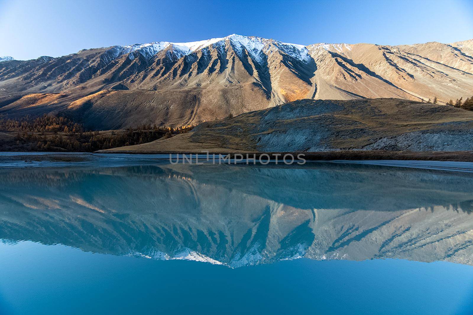 Mountain lake among the mountains on altai. The water surface of the lake.