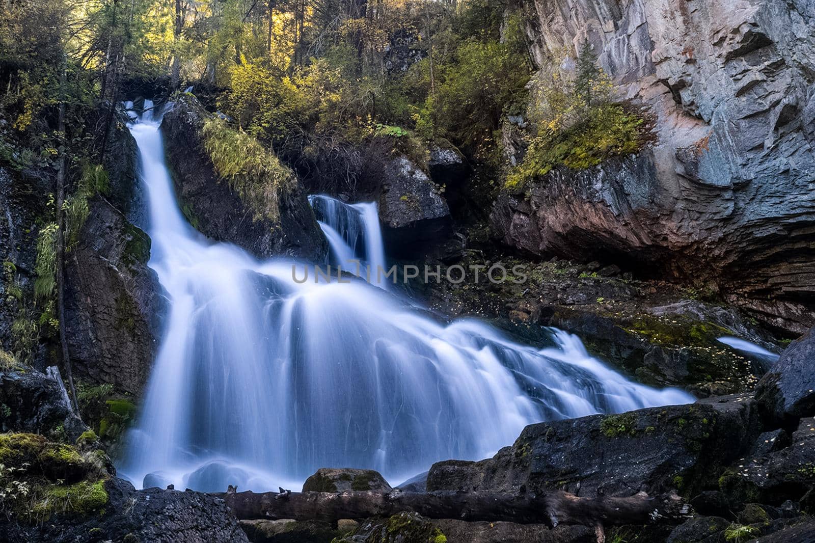 small waterfall on a mountain river in the Altai. The Altai Mountain Rivers. by DePo