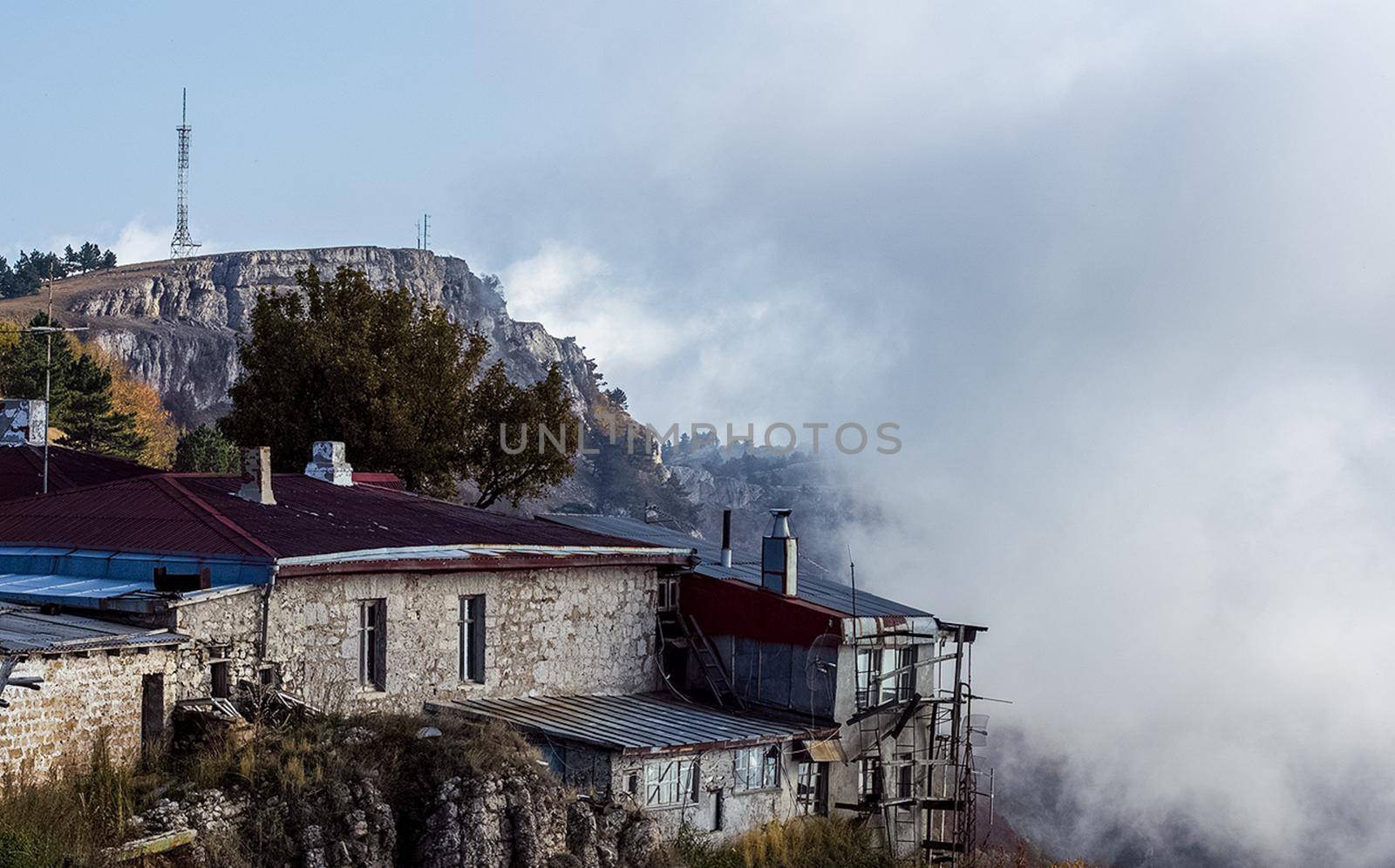 At home near the rocks. Stone houses in a mountain village. Crimea