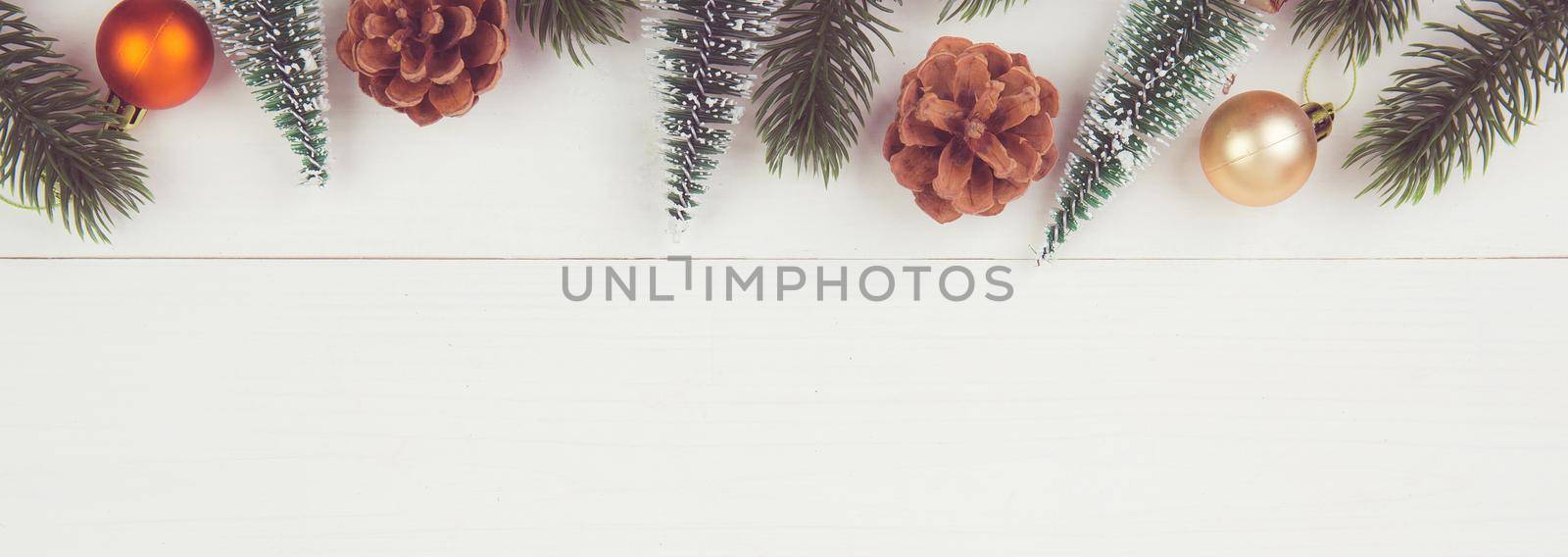 Christmas holiday composition decoration on wooden background, new year and xmas or anniversary with presents on wood table in season, celebrate and copy space, top view or flat lay, banner website.