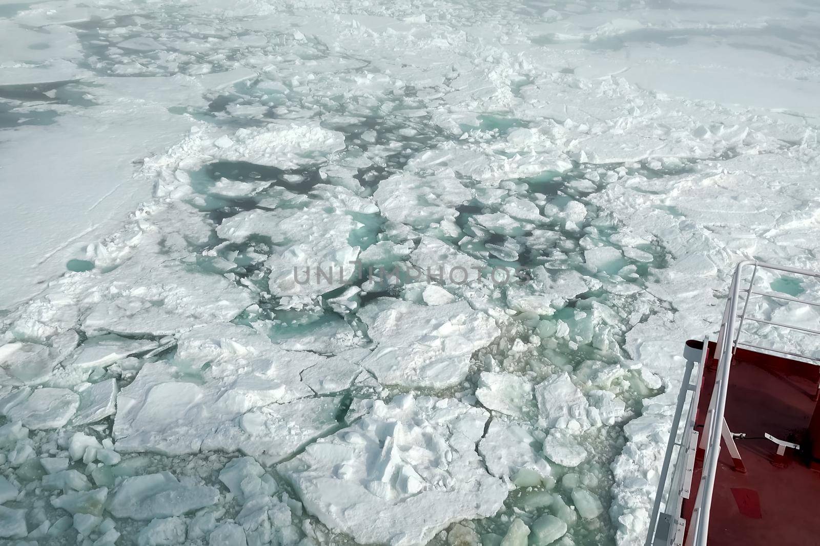 The feed of a ship sailing in the Arctic. Landscape of the Arctic from the deck of the tanker.