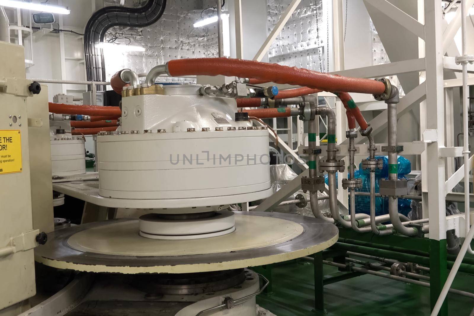 Murmansk, Russia - June 24, 2019: The engine compartment of the ship. Engine and steering equipment.