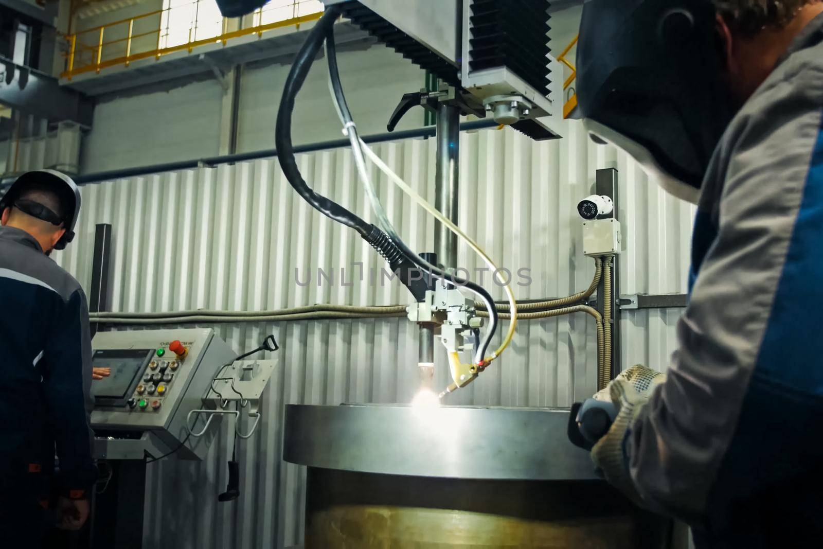 Cutting the welding parts out of the sheet of steel. Manufacturing plant