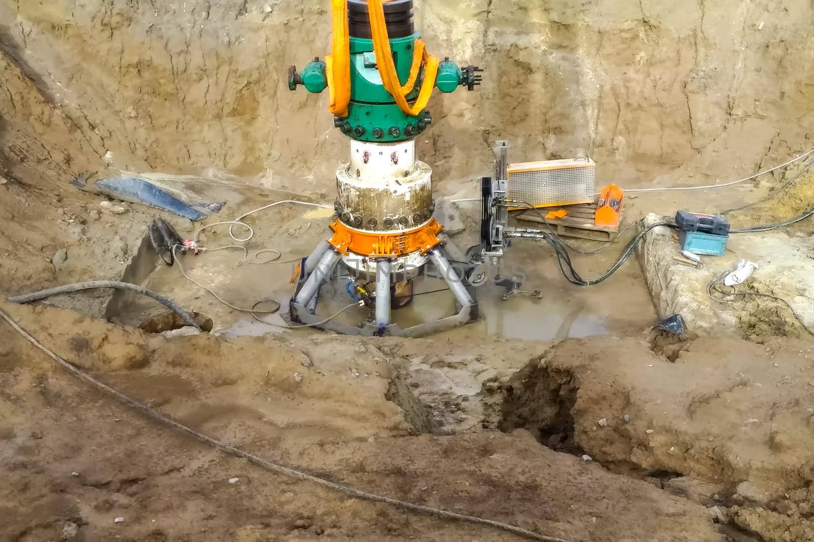Demolition of oil well equipment. The old liquidated well.