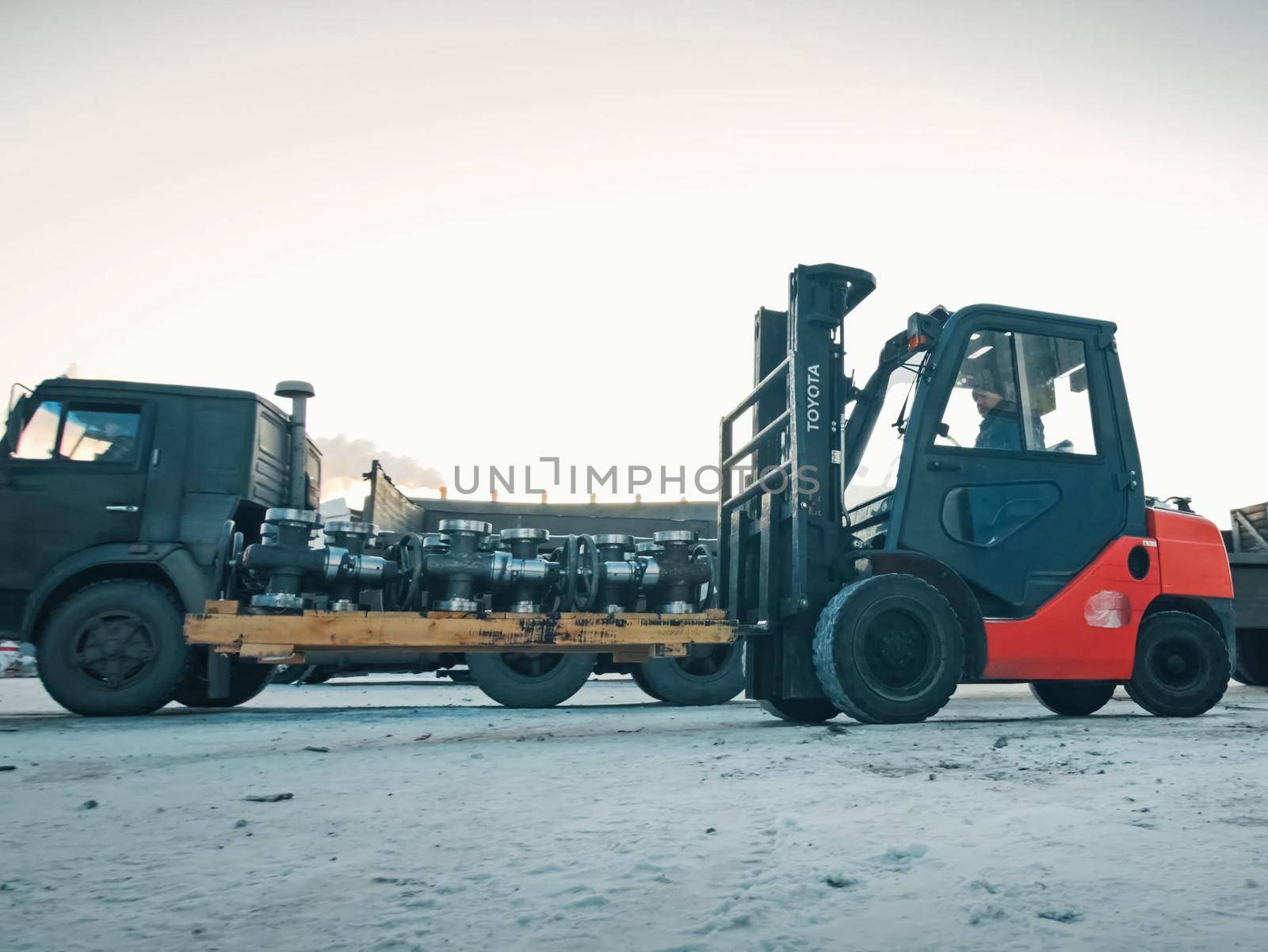 Moscow, Russia - January 23, 2019: Transporting oil catches on a loader.