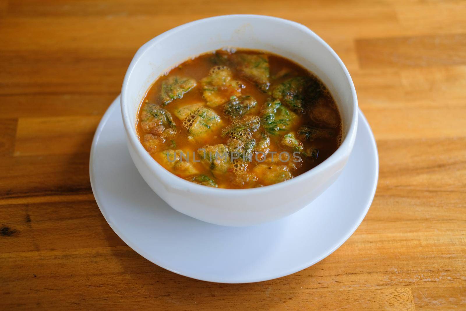 Sour curry soup made of Tamarind Paste with vegetable Acacia leaves omelet