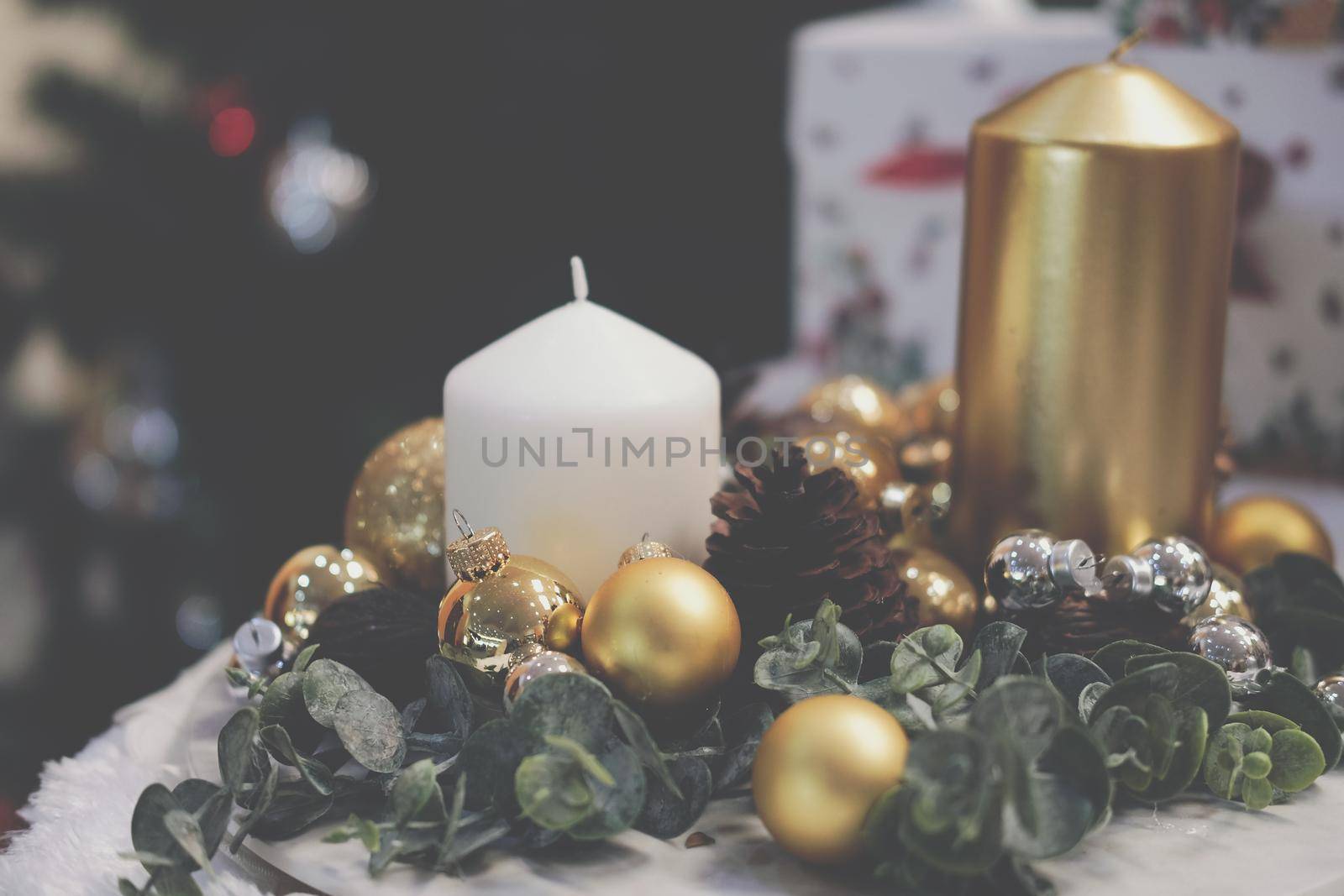 golden christmas balls. festive ornament decoration. candle, conifer cone