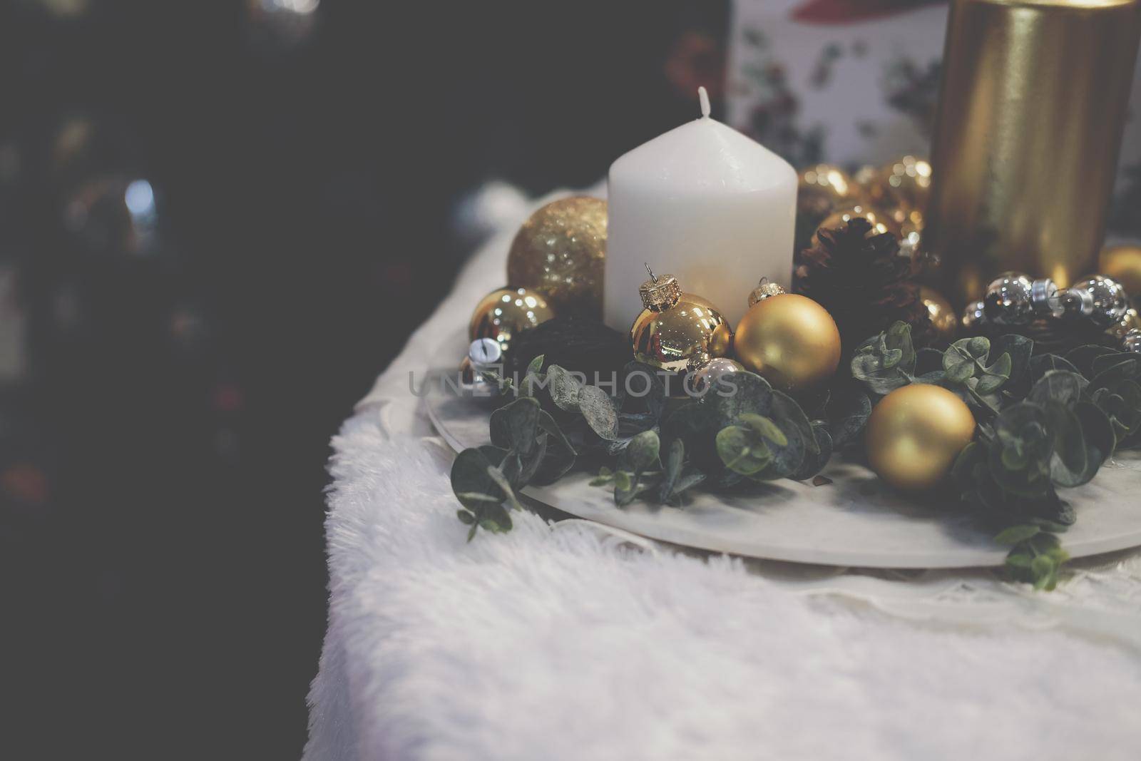 golden christmas balls. festive ornament decoration. candle, conifer cone