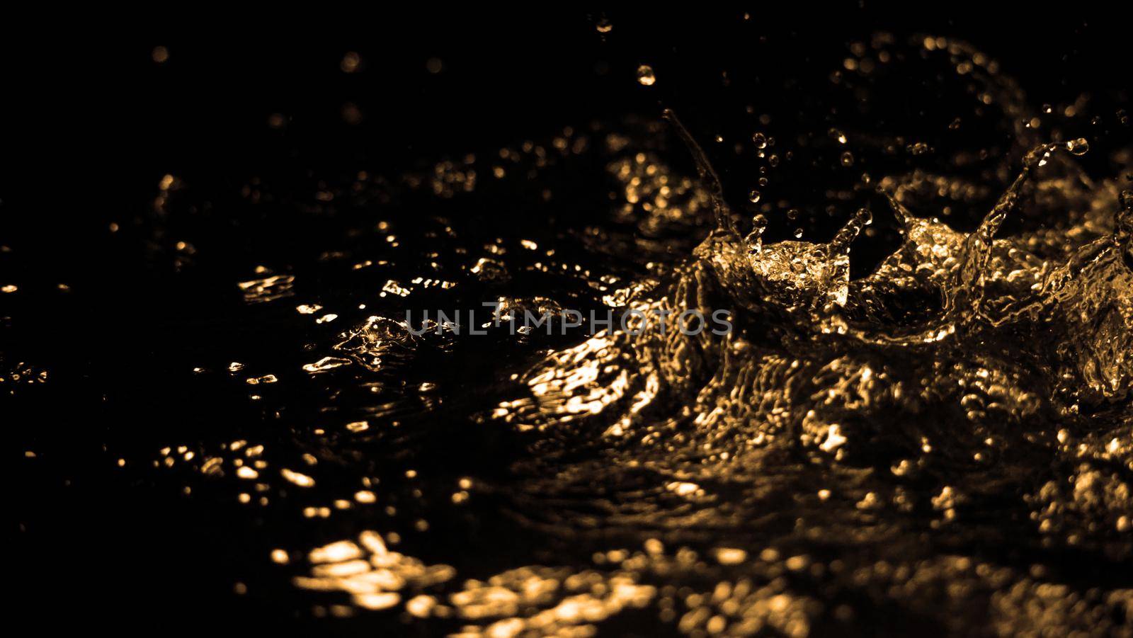 Hi speed close up images of oil liquid from diesel gasoline splashing by gnepphoto