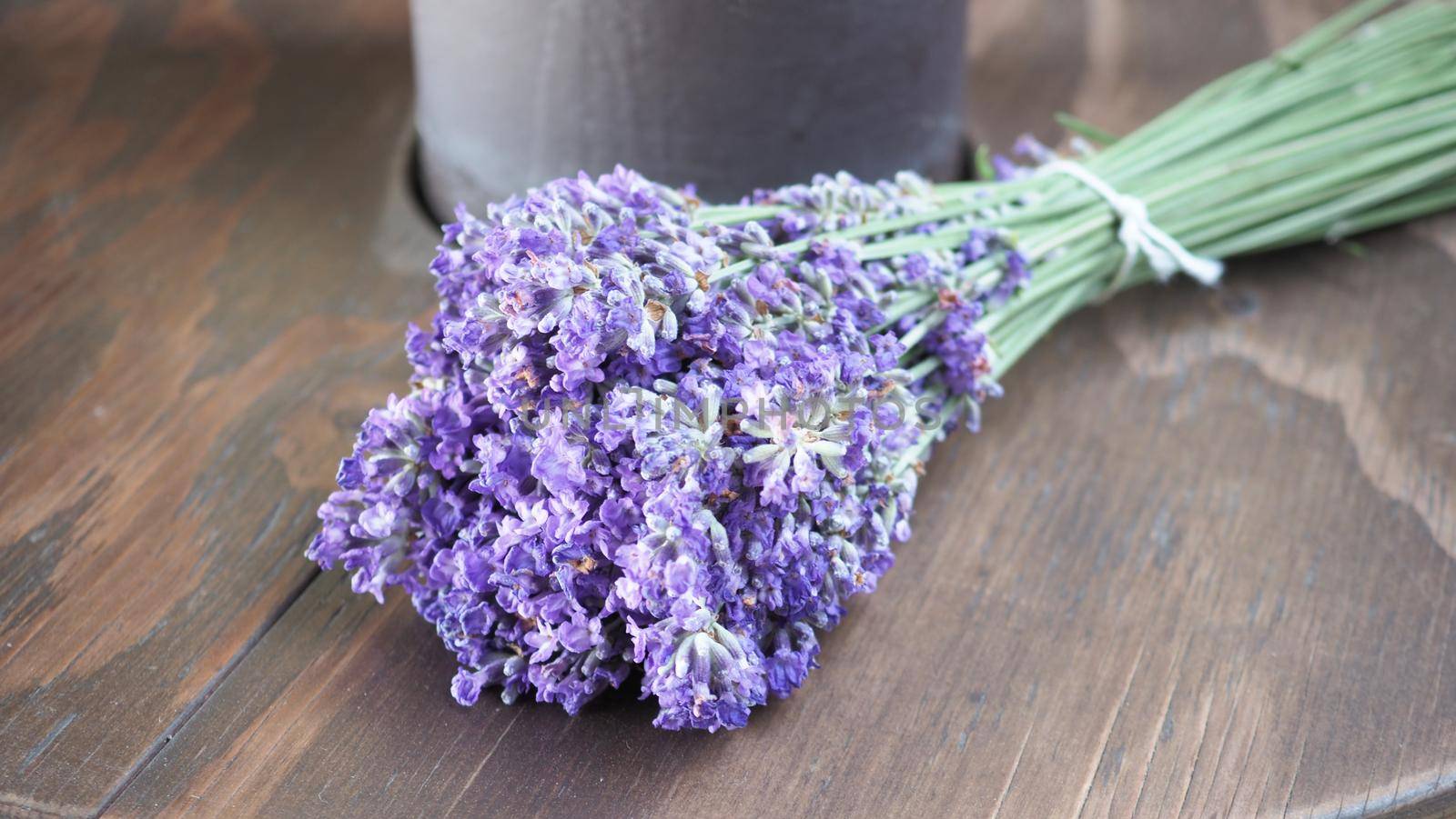 Bunch or bouquet of purple lavender flowers on a wood texture table. Group of lavandula from Furano province Hokkaido Sapporo Japan. Photo from above., aroma herbs concept