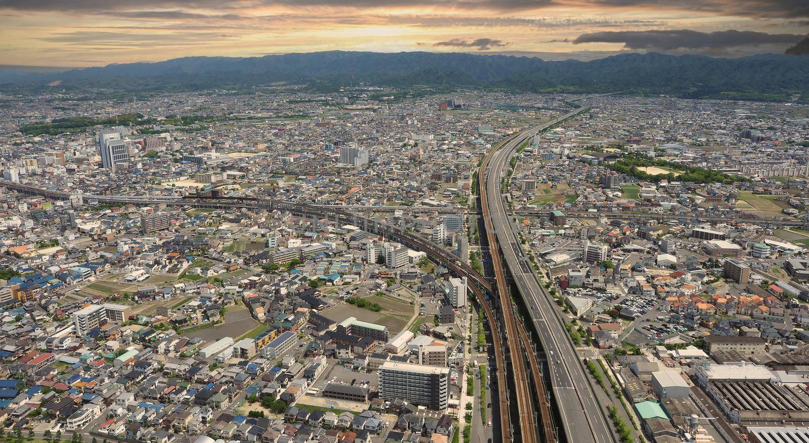 Aerial view or bird eyes view images of Kansai bay area Osaka Japan include big premium outlets located across from Kansai International Airport and it's largest airport in western Osaka bay Kansai Japan. 