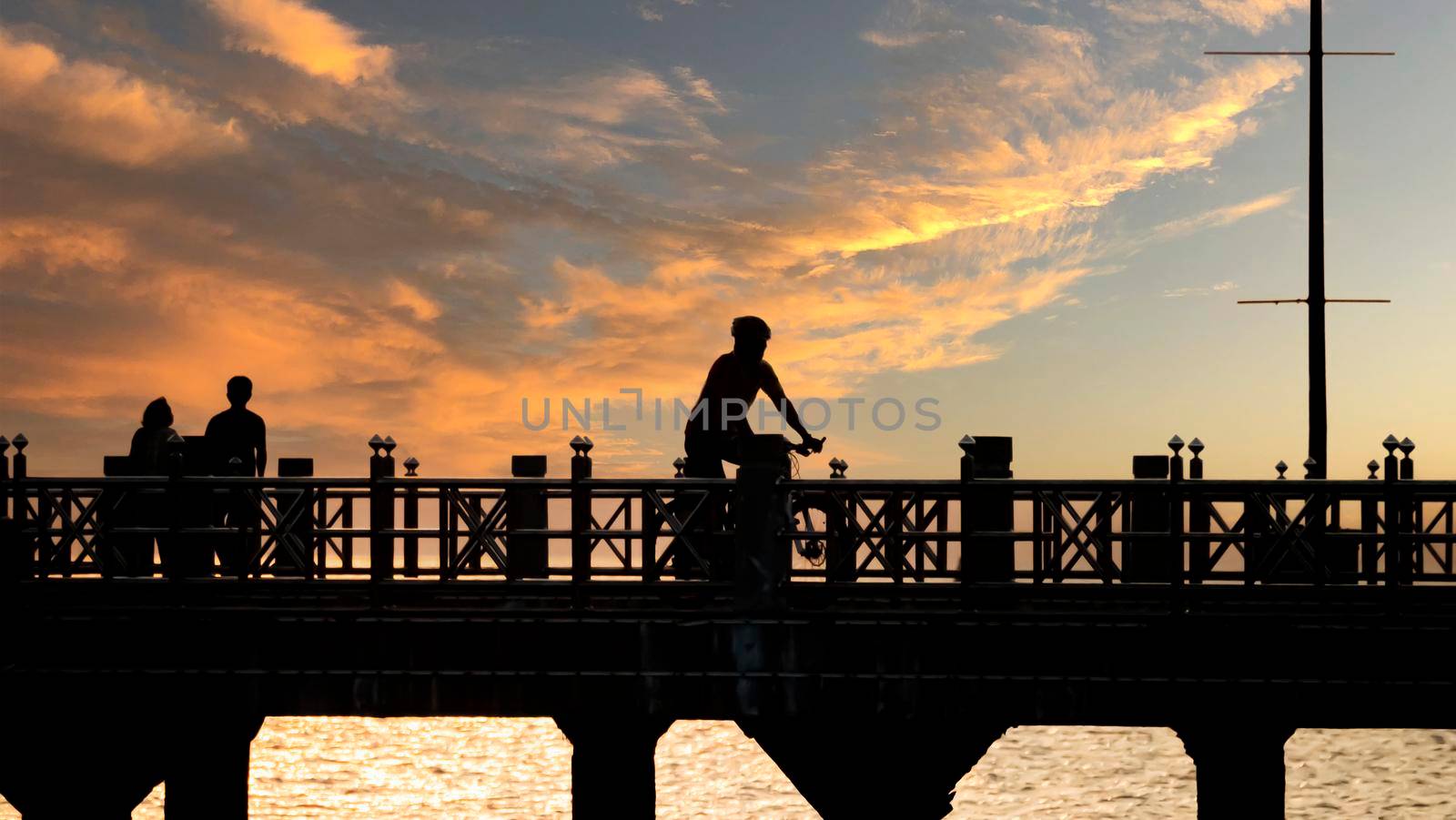 Bangsan Chonburi Thailand jetty and sunset. At Bangsan beach by gnepphoto