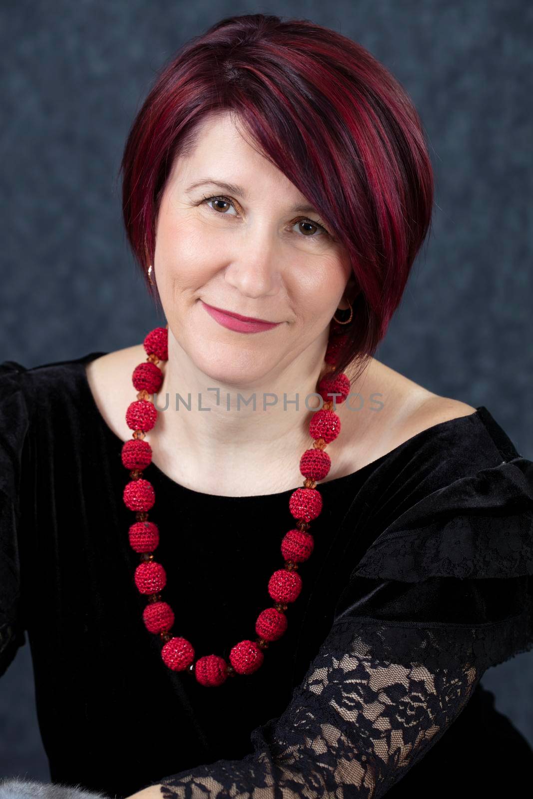 Portrait of an old woman. Beautiful mature woman.