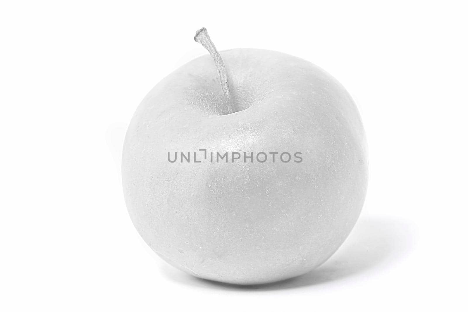 White apple on a white background. Colorless fruit. Winter fruit